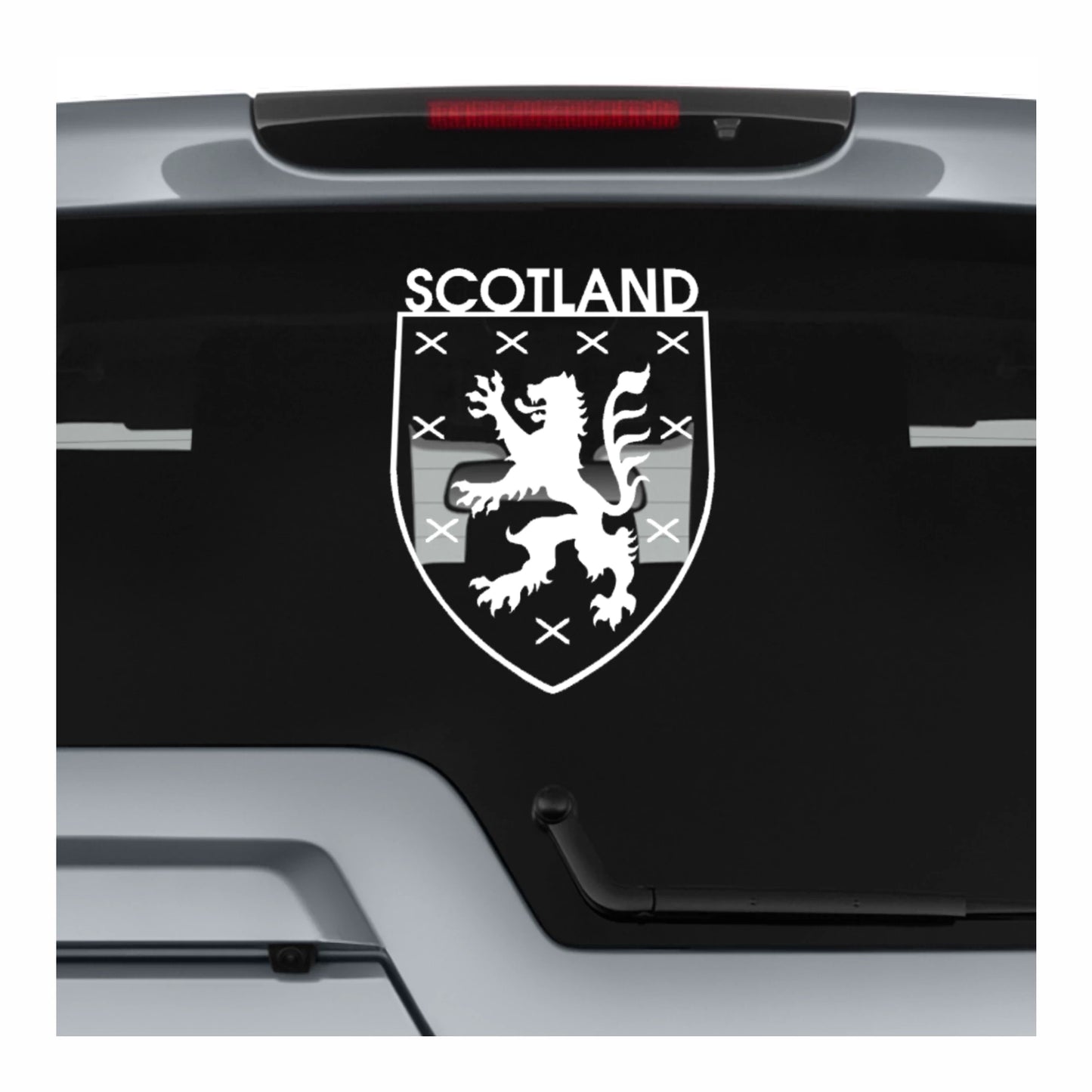 Scotland emblem with a lion on a black background on a car window