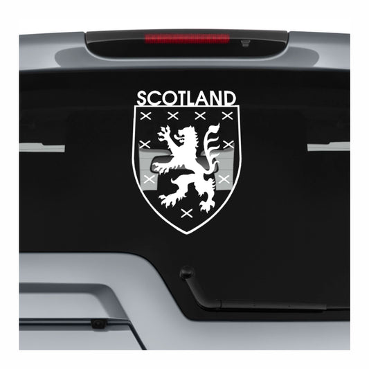 Scotland emblem with a lion on a black background on a car window