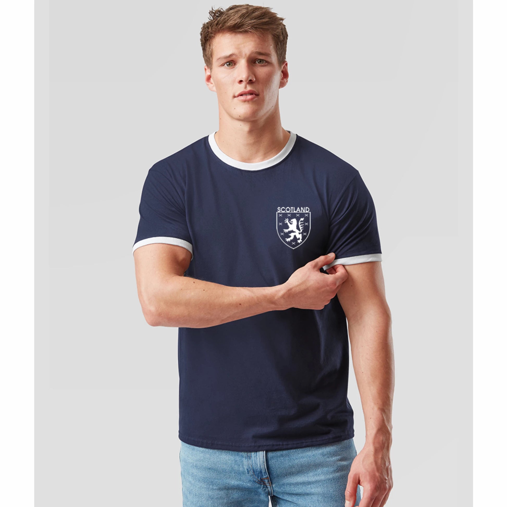 Navy blue Scotland world up 26 retro t-shirt with Scottish lion emblem with model.